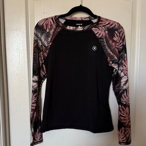 Hurley Women's Black Top with Pink Leaf Sleeves SPF 50